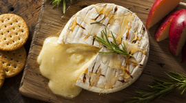 Oven-baked camembert with honey and rosemary