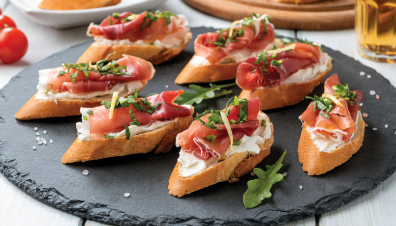 Crostini with cured ham and fresh cheese